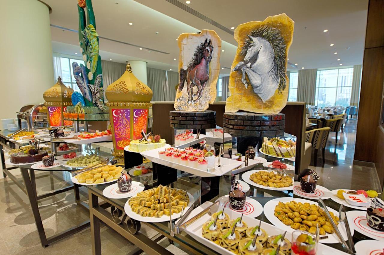 Holiday Suites Al Aziziah Mekke Dış mekan fotoğraf A buffet at the Jumeirah Jumeirah Hotel